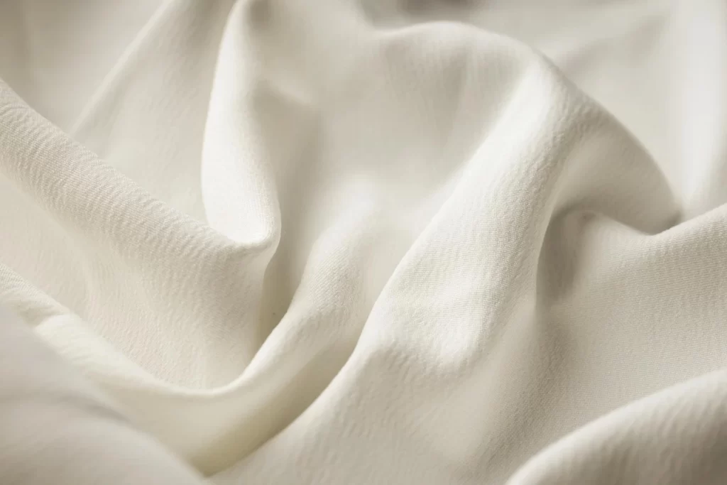Close-up view of premium cotton fabric texture used in quality apparel