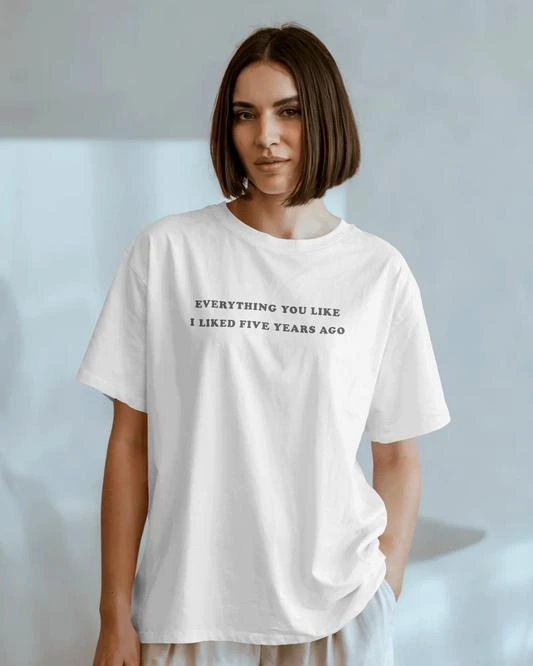 Modern outfit featuring a graphic tee styled with minimalist streetwear pieces